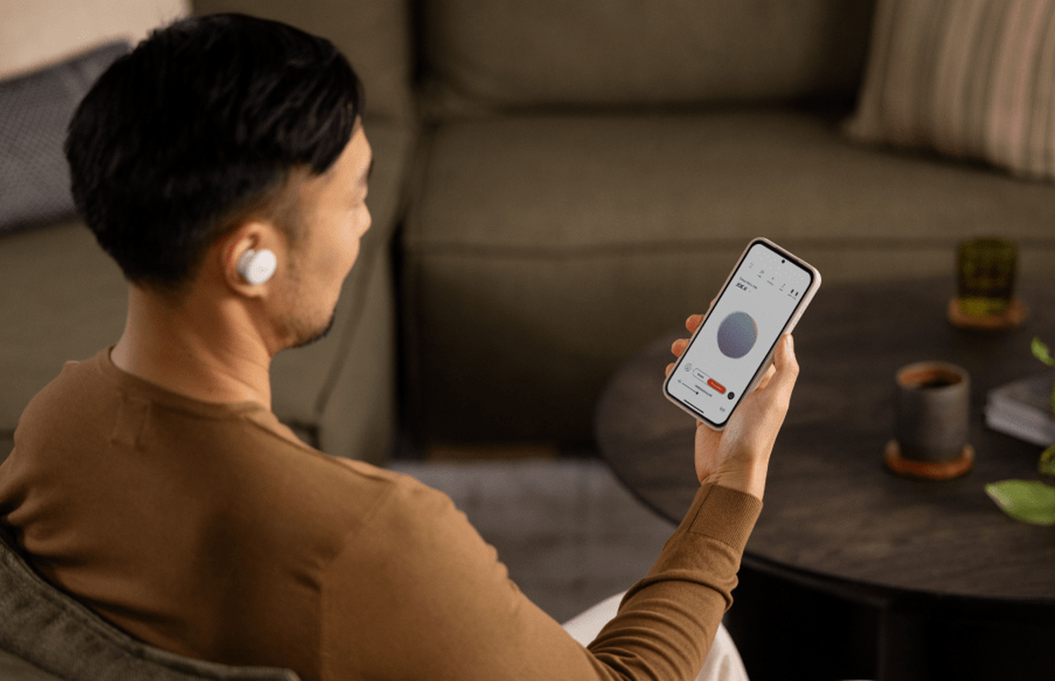 A man looking at his personal sound profile